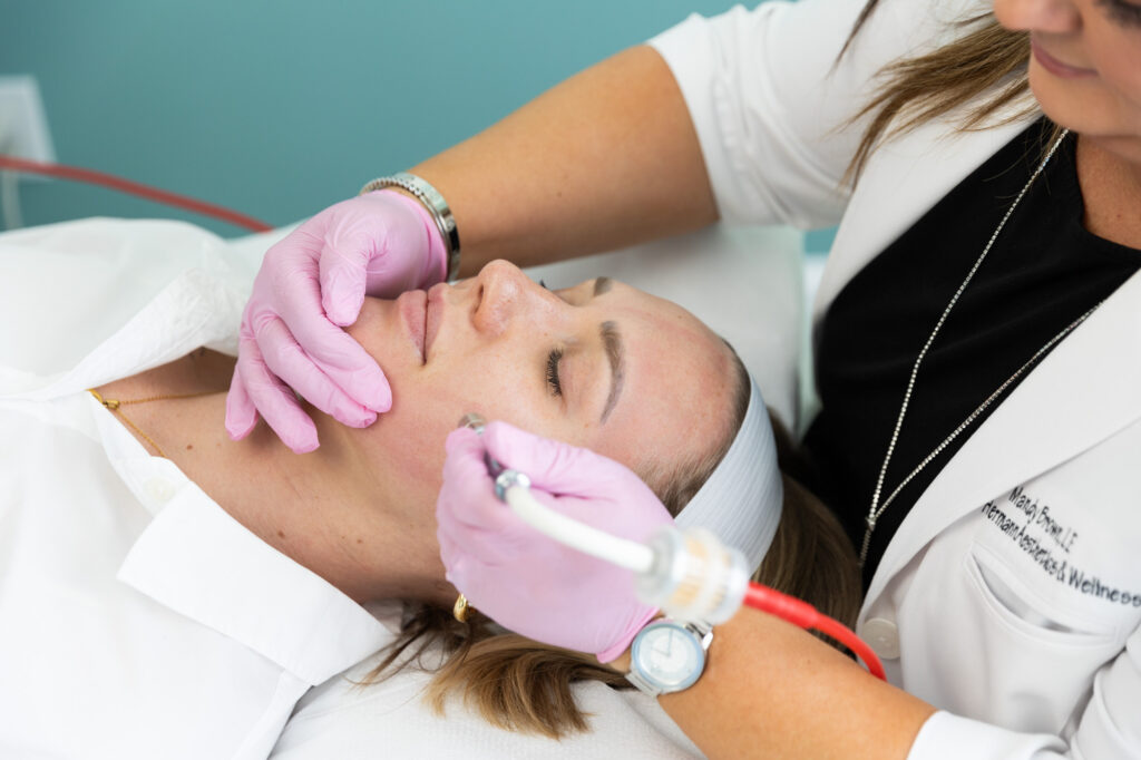 A patient enjoying their facial, a popular treatment for skin care in St. Petersburg. 