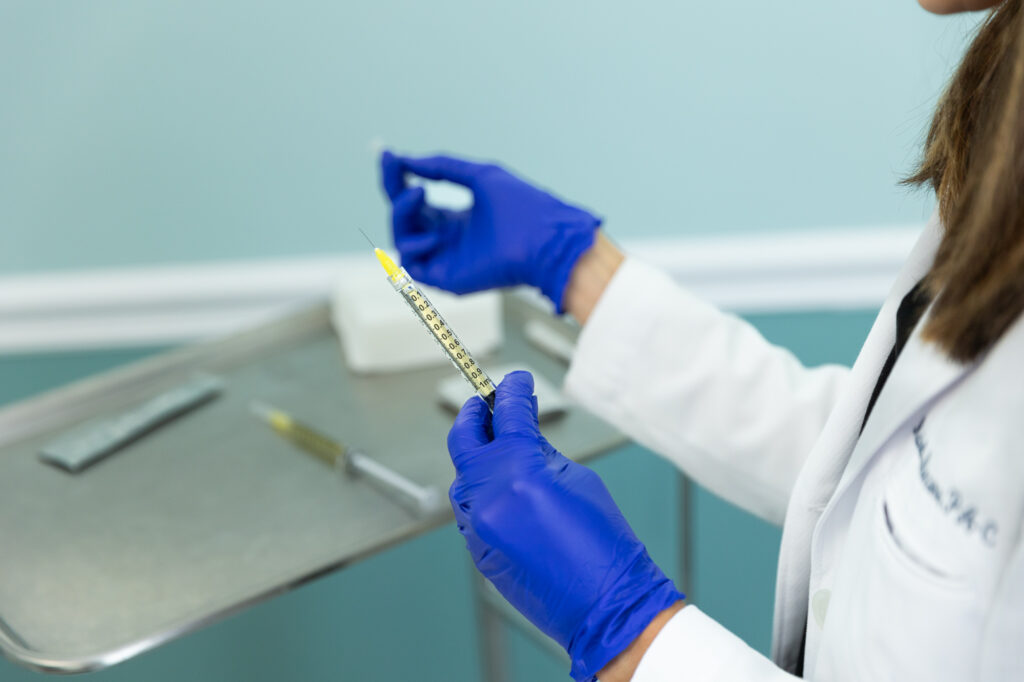 A provider prepares the platelet-rich plasma with a centrifuge for hair PRP in St. Petersburg.