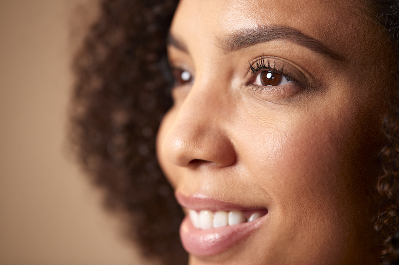 This closeup of a woman's face is clear and glowing after she invested in Botox and laser treatments in St. Petersburg.